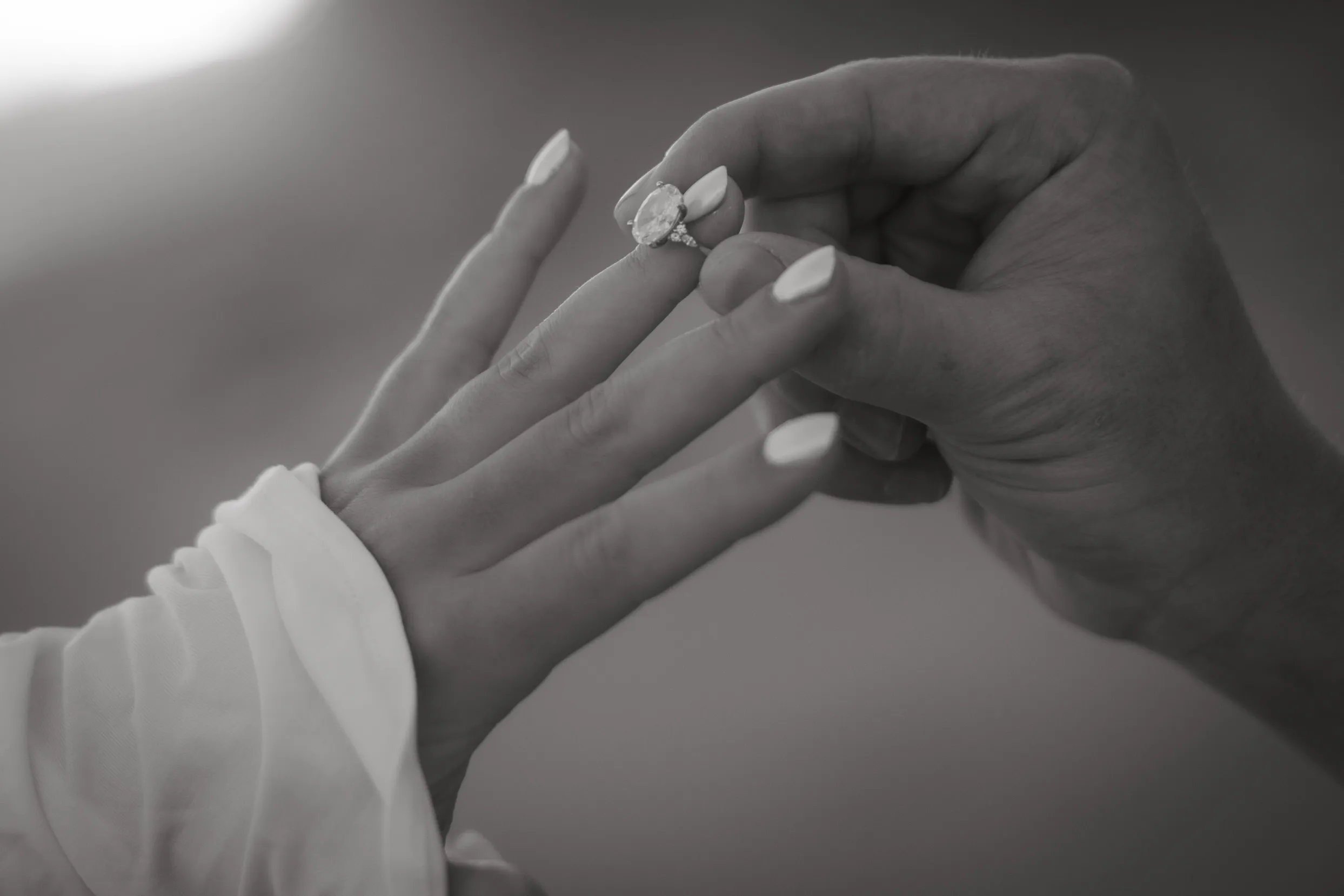 Black and white close-up of an engagement ring