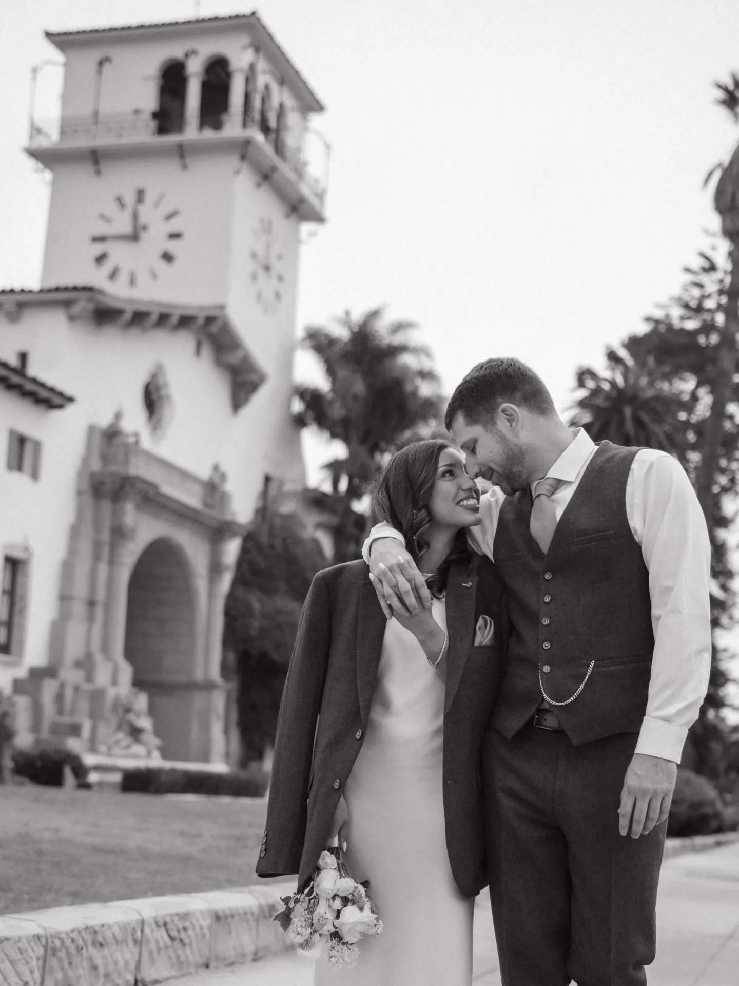 Couple beneath the Santa Barbara Courthouse clock tower