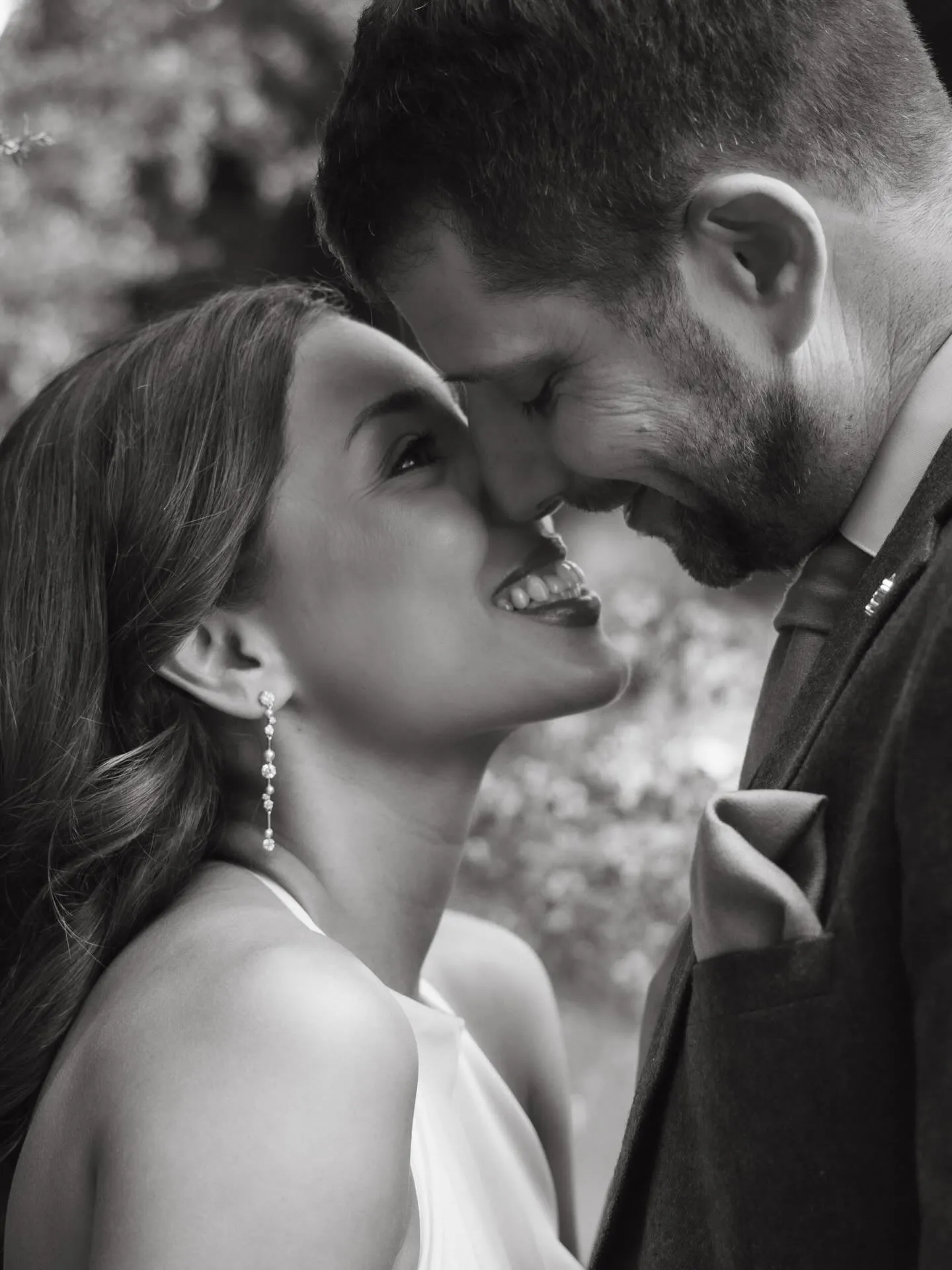 Black and white close-up of a couple kissing