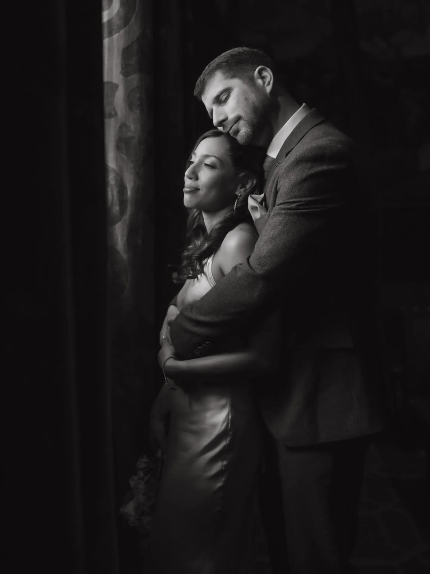 Dramatic low-light portrait of a couple