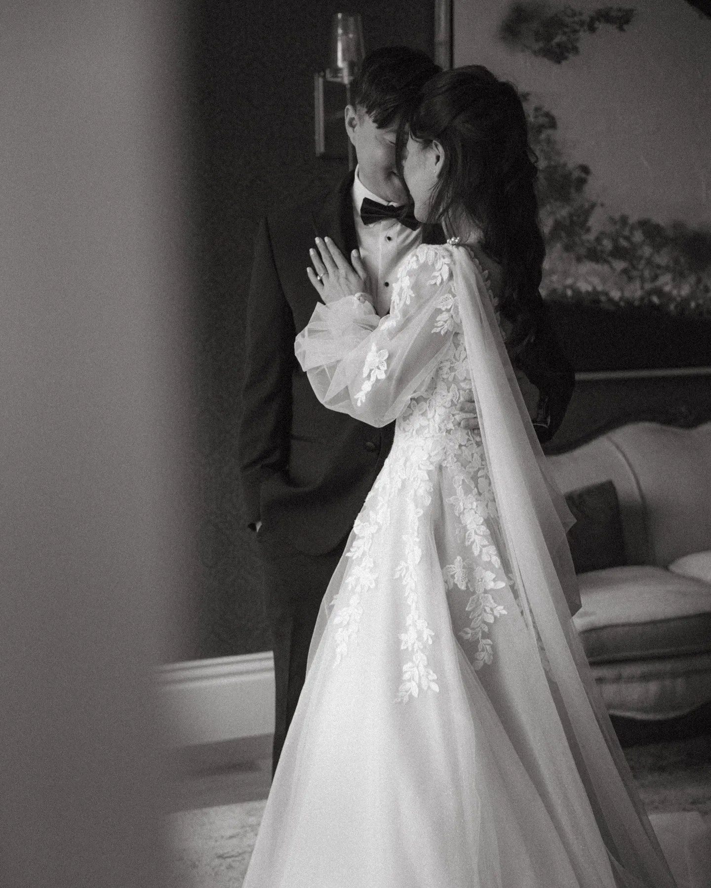 Black and white portrait of a bride in her gown